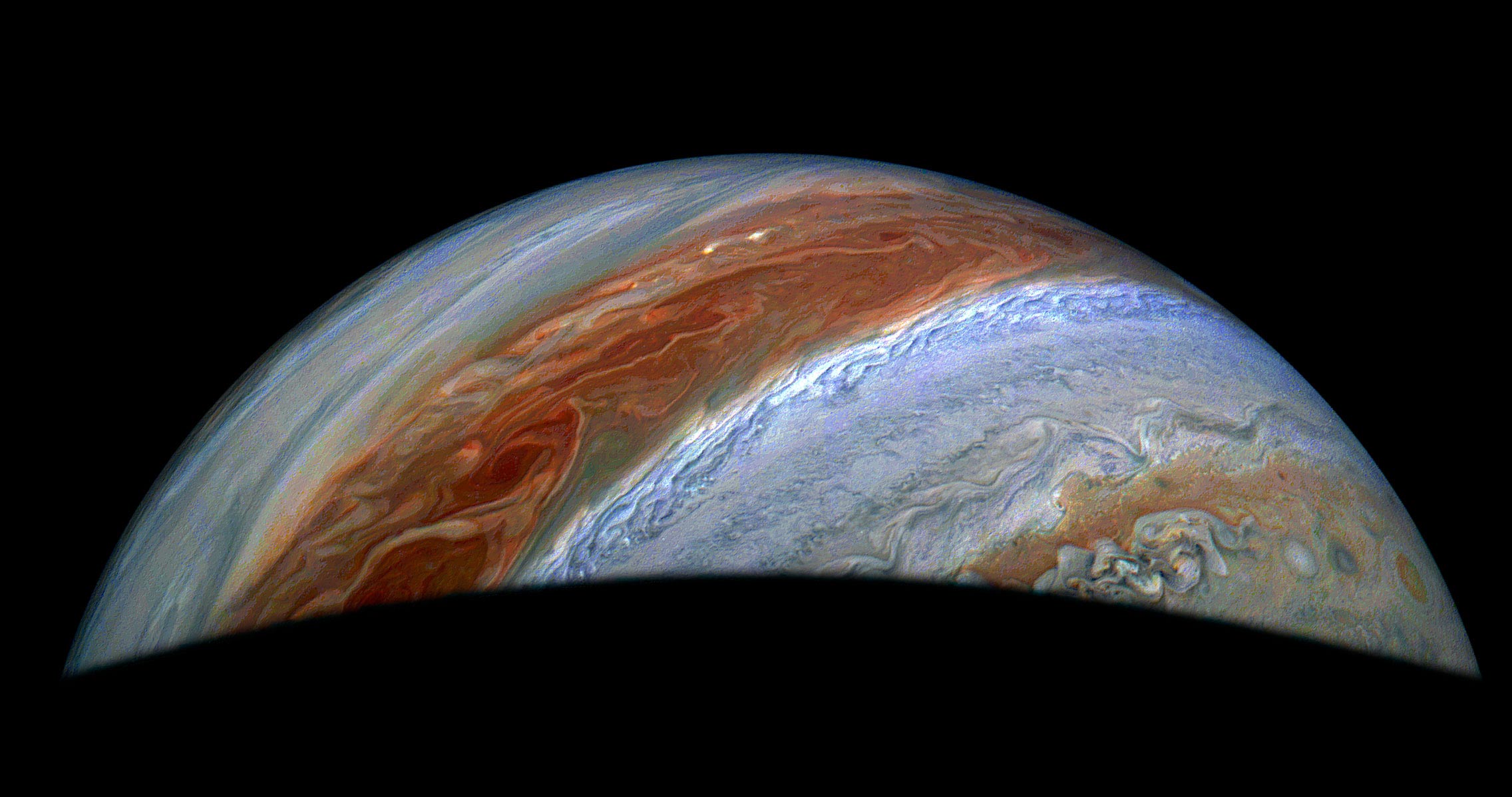 Juno Mission Reveals Io's Volcanic Activity and Jupiter's Cyclones Dynamics