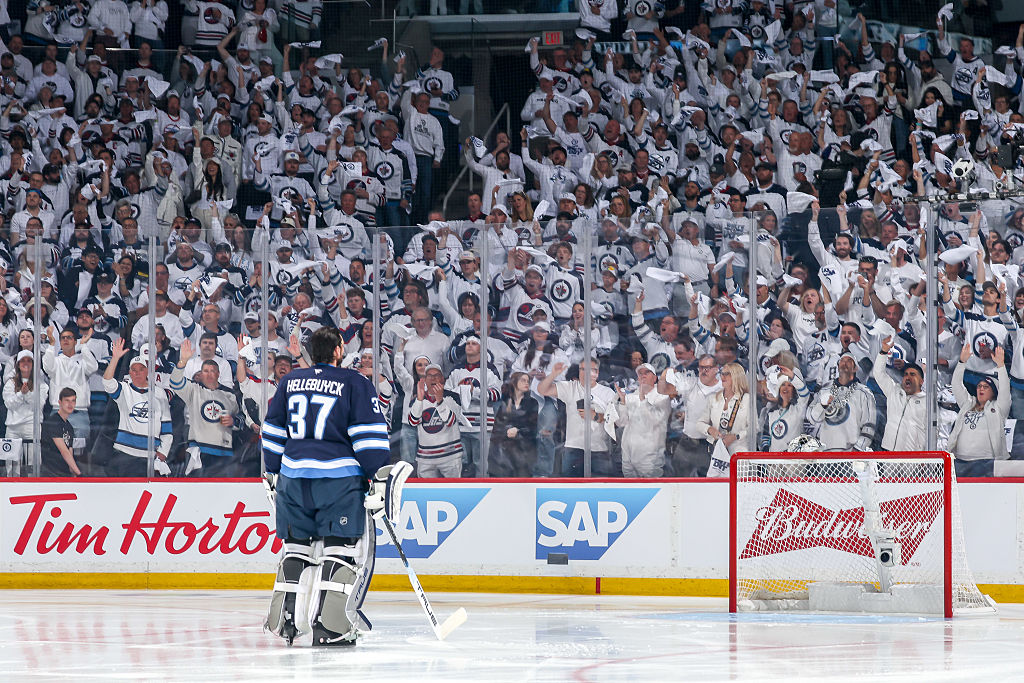 Connor Hellebuyck's Playoff Reprieve: Jets Goalie Bounces Back in Game 7